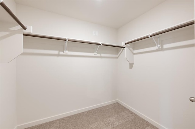 5515 Windstone Dr, Norman, OK 73072 - spacious closet featuring carpet floors