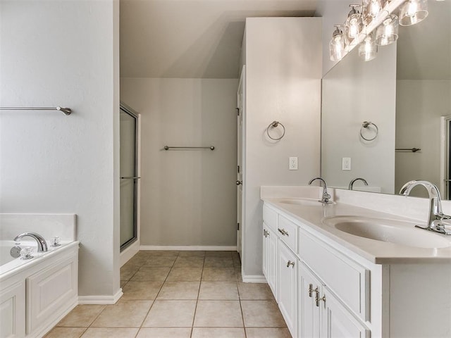 bathroom with a shower with shower door, a bath, double vanity, a chandelier, and tile patterned floors