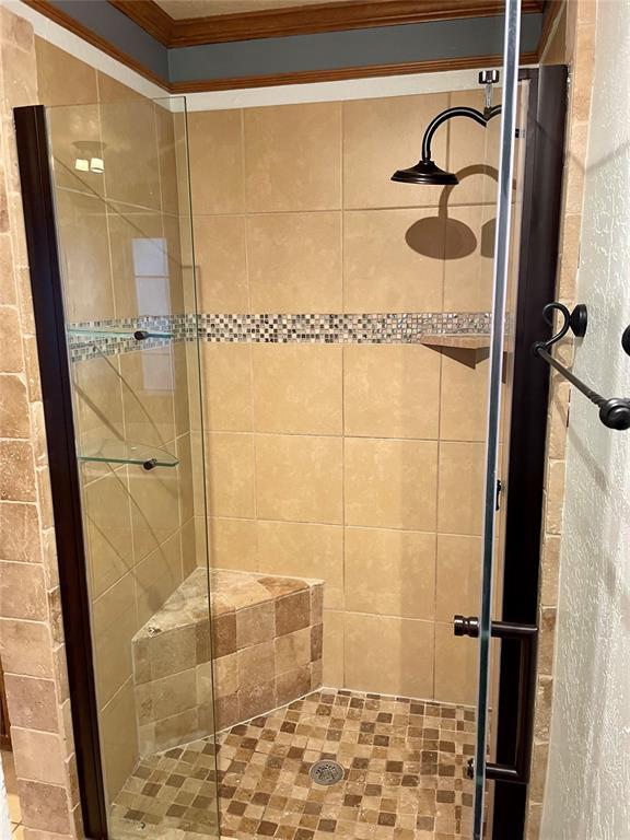 3113 SW 125th St, Oklahoma City, OK 73170 - full bathroom featuring a stall shower and ornamental molding
