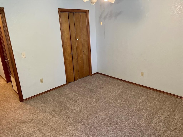 3113 SW 125th St, Oklahoma City, OK 73170 - unfurnished bedroom with light colored carpet, baseboards, a closet, and ceiling fan