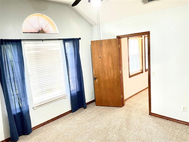 3113 SW 125th St, Oklahoma City, OK 73170 - carpeted empty room featuring ceiling fan, vaulted ceiling, and baseboards