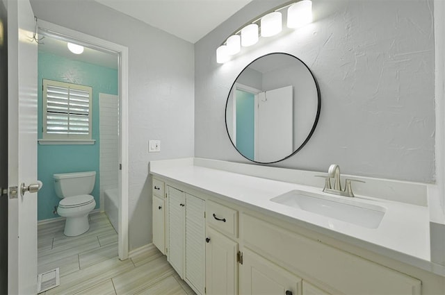 8720 Raven Ave, Oklahoma City, OK 73132 - bathroom featuring toilet, vanity, a tub to relax in, and a shower