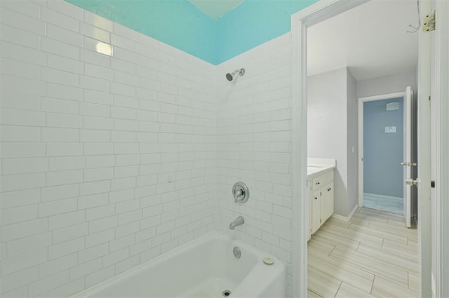 8720 Raven Ave, Oklahoma City, OK 73132 - full bathroom with shower / tub combination, vanity, and baseboards