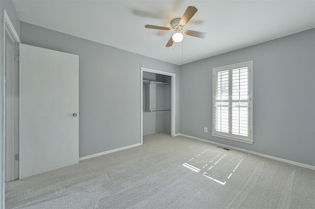 8720 Raven Ave, Oklahoma City, OK 73132 - unfurnished bedroom featuring carpet flooring, a closet, ceiling fan, and baseboards