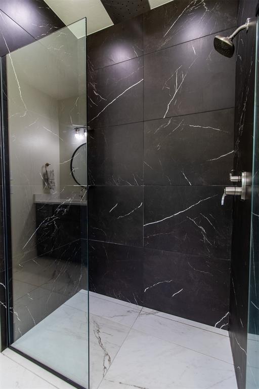 full bath with a walk in shower