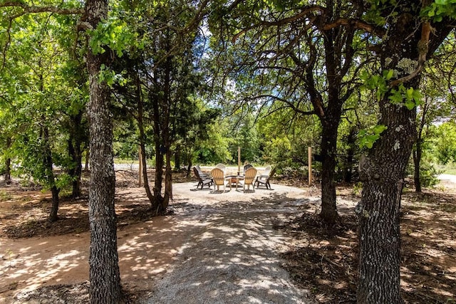 view of patio with an outdoor fire pit