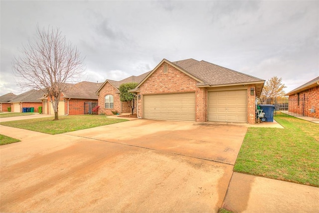 5608 Bent Creek Dr, Oklahoma City, OK 73135 - view of front of property with brick siding, a garage, concrete driveway, and roof with shingles
