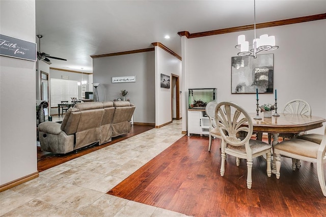 5608 Bent Creek Dr, Oklahoma City, OK 73135 - dining room featuring ornamental molding, a chandelier, a ceiling fan, and baseboards
