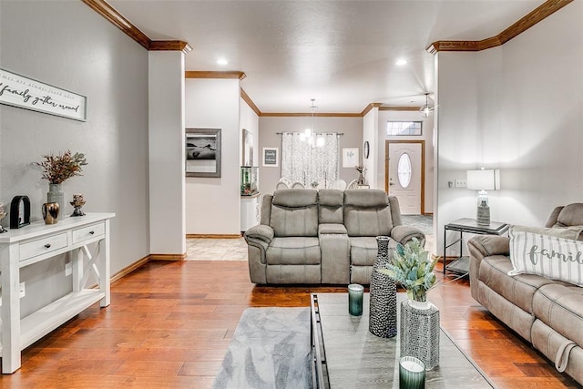 5608 Bent Creek Dr, Oklahoma City, OK 73135 - living area featuring crown molding, a chandelier, light wood-type flooring, baseboards, and recessed lighting