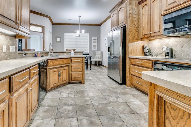 5608 Bent Creek Dr, Oklahoma City, OK 73135 - kitchen with stainless steel appliances, a sink, decorative backsplash, light countertops, and ornamental molding