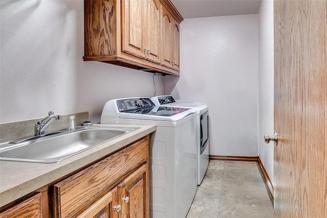 5608 Bent Creek Dr, Oklahoma City, OK 73135 - washroom featuring cabinet space, washing machine and clothes dryer, and baseboards
