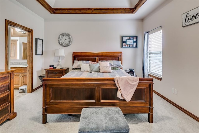 5608 Bent Creek Dr, Oklahoma City, OK 73135 - bedroom with light colored carpet, ensuite bathroom, and baseboards