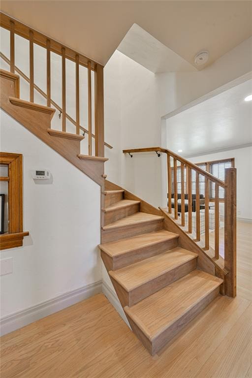 2650 NW 25th St, Oklahoma City, OK 73107 - stairway featuring wood finished floors and baseboards