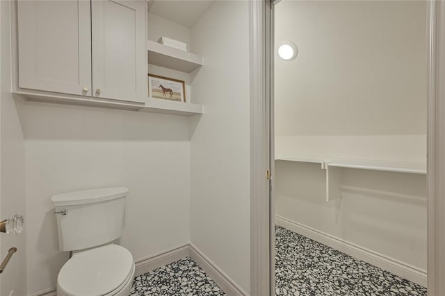 2650 NW 25th St, Oklahoma City, OK 73107 - bathroom with toilet and baseboards