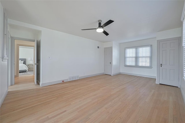 2650 NW 25th St, Oklahoma City, OK 73107 - spare room with light wood-type flooring, ceiling fan, and baseboards