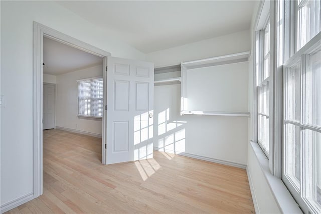 2650 NW 25th St, Oklahoma City, OK 73107 - empty room featuring light wood finished floors and baseboards