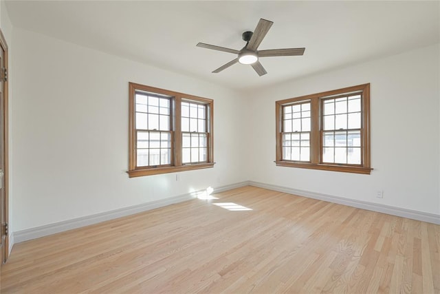 2650 NW 25th St, Oklahoma City, OK 73107 - spare room with light wood finished floors, ceiling fan, and baseboards