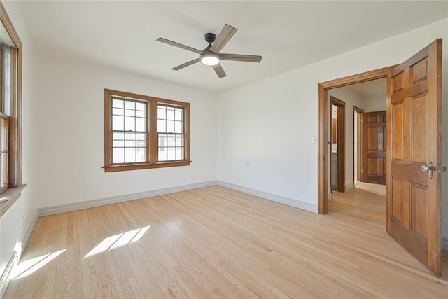 2650 NW 25th St, Oklahoma City, OK 73107 - unfurnished room with light wood finished floors, ceiling fan, and baseboards