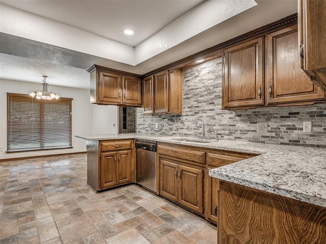 4400 Windsong Way, Oklahoma City, OK 73120 - kitchen featuring dishwasher, a sink, a chandelier, a peninsula, and backsplash