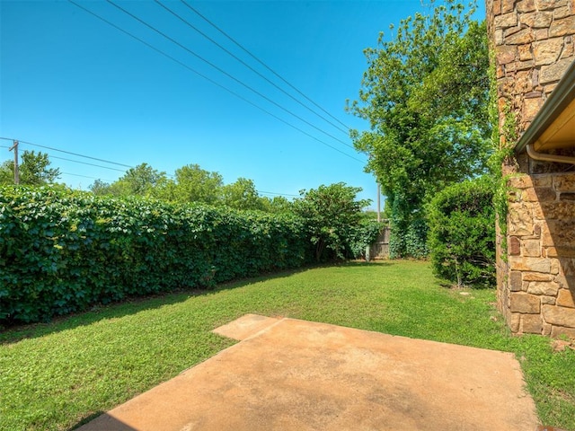 4400 Windsong Way, Oklahoma City, OK 73120 - view of yard with a patio