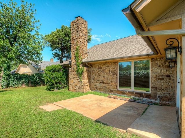 4400 Windsong Way, Oklahoma City, OK 73120 - view of green lawn with a patio area