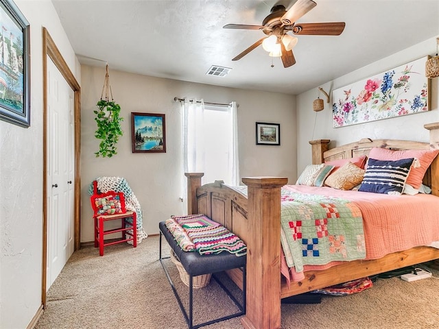 bedroom with carpet floors, baseboards, and ceiling fan