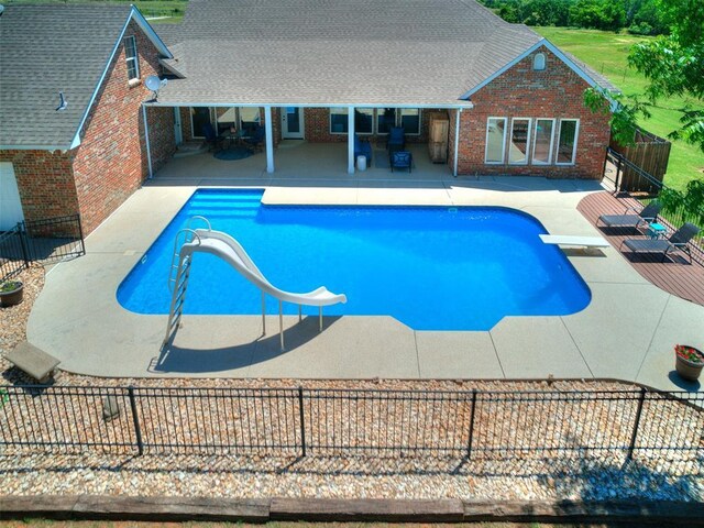 1486 County St Unit 2910 20, Acres Tuttle, OK 73089 - view of pool with a patio, a fenced backyard, and a diving board