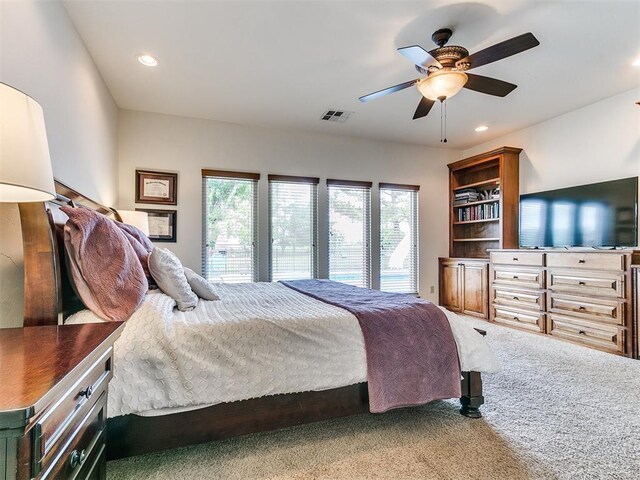1486 County St Unit 2910 20, Acres Tuttle, OK 73089 - carpeted bedroom featuring multiple windows, recessed lighting, and a ceiling fan