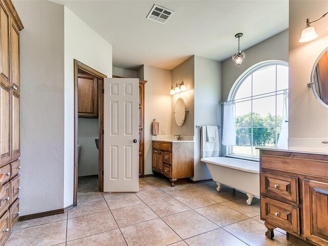 1486 County St Unit 2910 20, Acres Tuttle, OK 73089 - full bathroom with vanity, a soaking tub, and tile patterned flooring