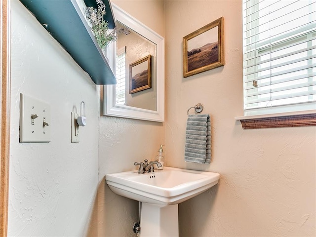 1486 County St Unit 2910 20, Acres Tuttle, OK 73089 - bathroom featuring a sink and a textured wall