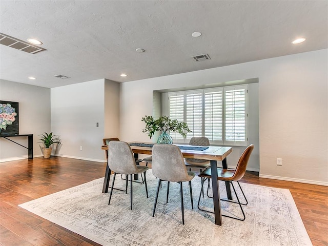 6709 Reed Dr, Oklahoma City, OK 73116 - dining space with baseboards, wood finished floors, and recessed lighting