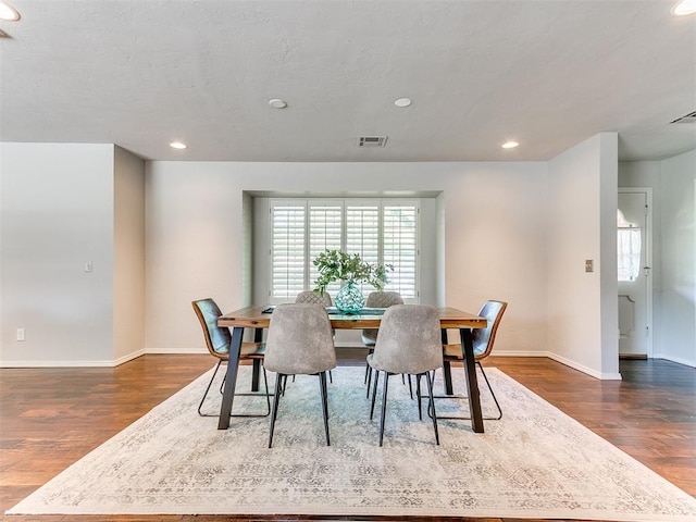 6709 Reed Dr, Oklahoma City, OK 73116 - dining room featuring baseboards, dark wood-type flooring, and recessed lighting