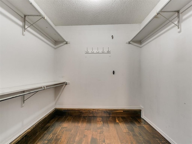 6709 Reed Dr, Oklahoma City, OK 73116 - spacious closet with hardwood / wood-style flooring