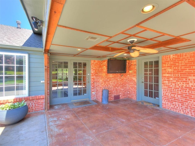 6709 Reed Dr, Oklahoma City, OK 73116 - view of patio / terrace featuring a ceiling fan and french doors