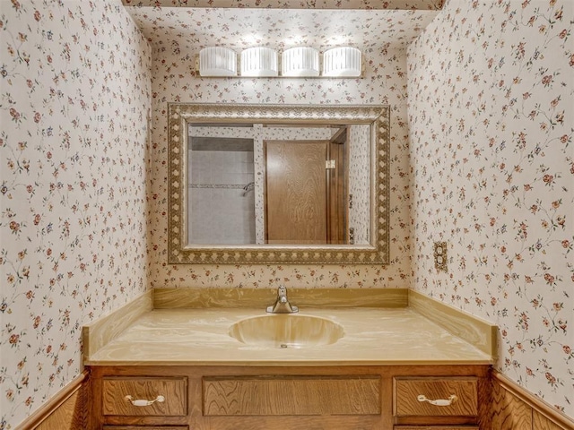 2915 N W Oaks Pl, Newcastle, OK 73065 - bathroom featuring wallpapered walls and vanity