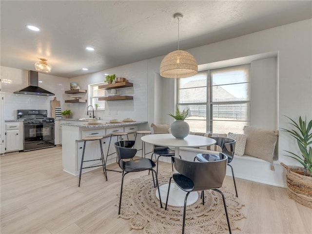 5613 NW 115th St, Oklahoma City, OK 73162 - dining area with light wood-type flooring and recessed lighting