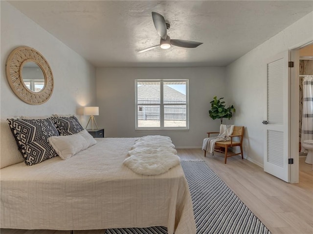 5613 NW 115th St, Oklahoma City, OK 73162 - bedroom featuring wood finished floors, baseboards, and a ceiling fan
