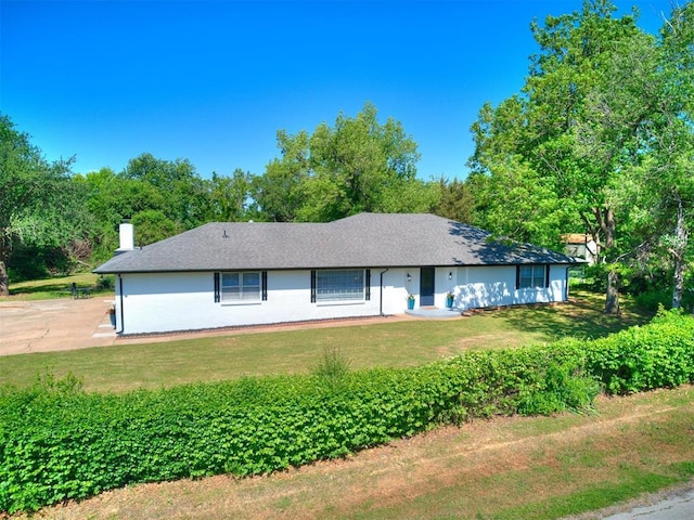 6501 N Laird Ave, Oklahoma City, OK 73105 - ranch-style house featuring a front lawn and a chimney