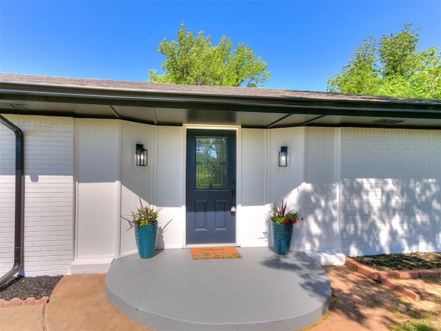 6501 N Laird Ave, Oklahoma City, OK 73105 - property entrance featuring brick siding