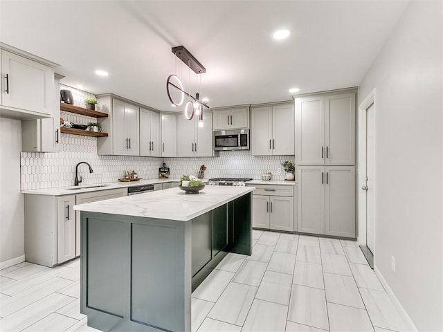 6501 N Laird Ave, Oklahoma City, OK 73105 - kitchen featuring stainless steel microwave, open shelves, a sink, gray cabinetry, and recessed lighting