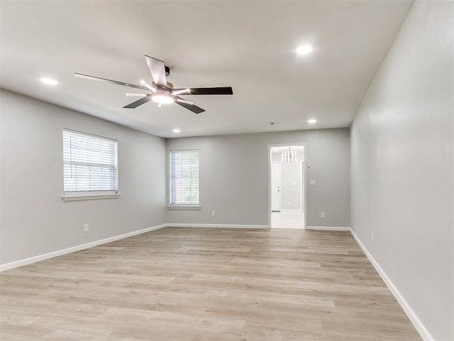 6501 N Laird Ave, Oklahoma City, OK 73105 - unfurnished room featuring ceiling fan, recessed lighting, light wood-type flooring, and baseboards