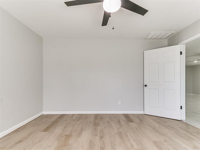 6501 N Laird Ave, Oklahoma City, OK 73105 - unfurnished bedroom featuring light wood finished floors, baseboards, and ceiling fan