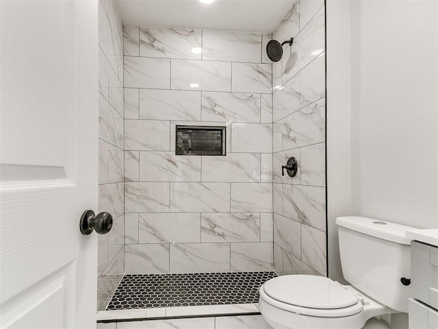 6501 N Laird Ave, Oklahoma City, OK 73105 - full bathroom with toilet, tiled shower, and marble finish flooring