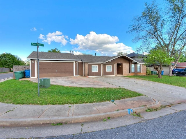 single story home with an attached garage and concrete driveway