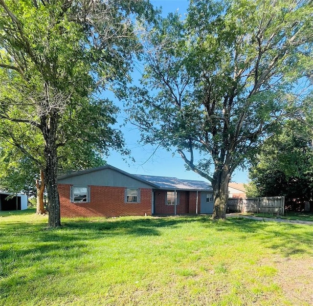 2217 7th St, Prague, OK 74864 - back of house with brick siding