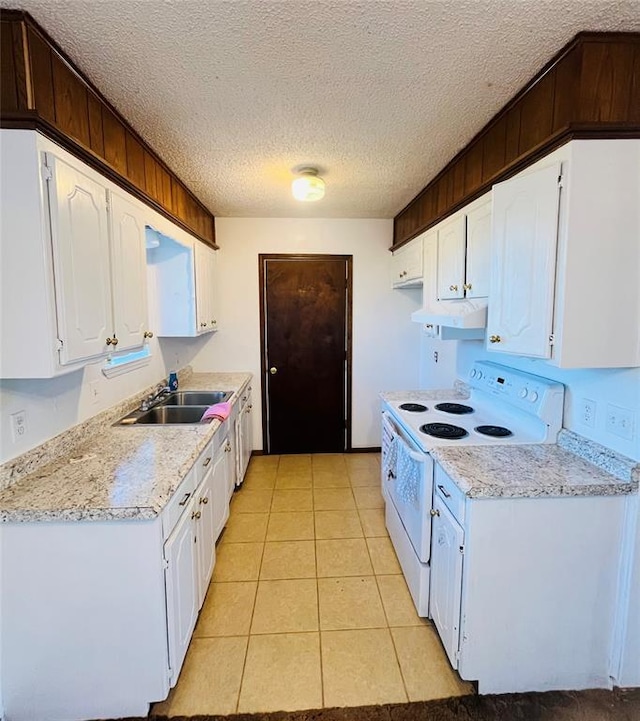 2217 7th St, Prague, OK 74864 - kitchen featuring white range with electric stovetop, a sink, exhaust hood, white cabinets, and a textured ceiling