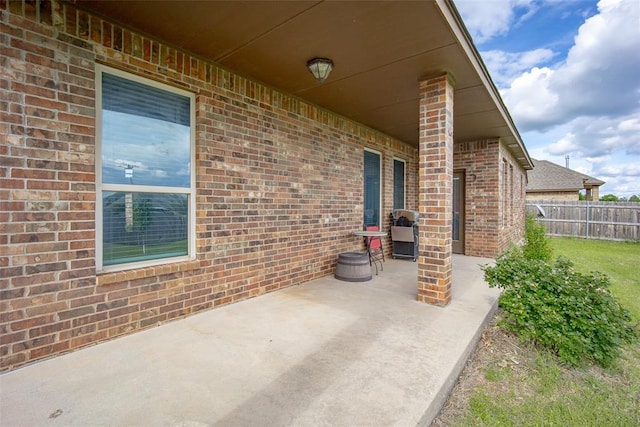 708 Carol Ann Pl, Moore, OK 73160 - view of patio featuring fence
