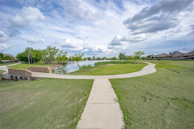708 Carol Ann Pl, Moore, OK 73160 - view of home's community with a water view and a lawn