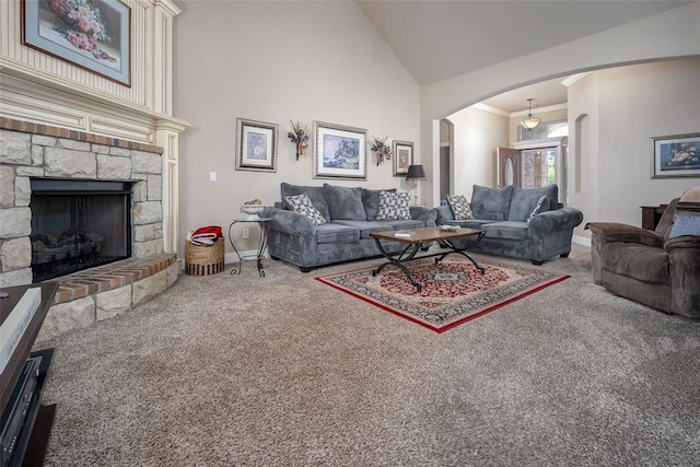 708 Carol Ann Pl, Moore, OK 73160 - living area featuring carpet, arched walkways, high vaulted ceiling, crown molding, and baseboards