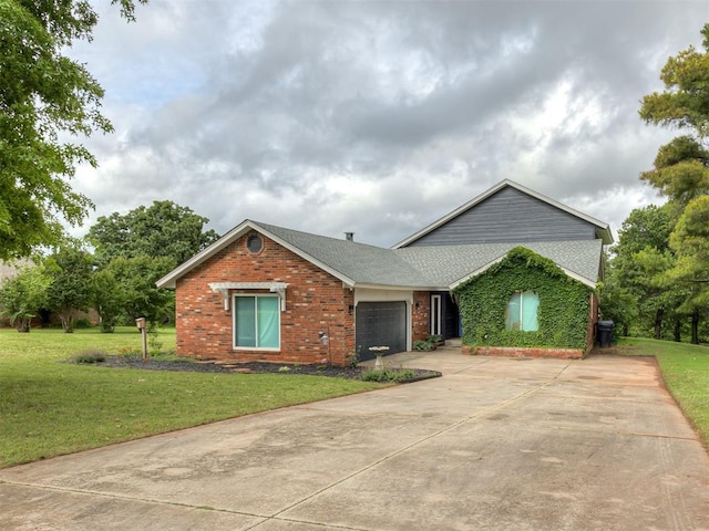 6401 Saddleback Dr, Oklahoma City, OK 73150 - ranch-style house featuring a front lawn, brick siding, a garage, concrete driveway, and a shingled roof